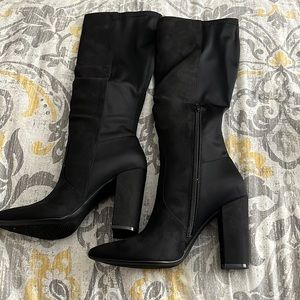 Brand new black heeled boots